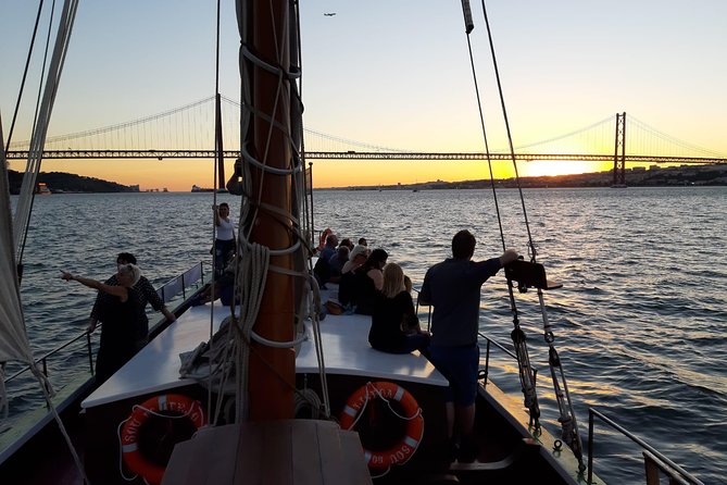 2-Hour Lisbon Traditional Boats Sunset Cruise with White Wine - Under the 25 de Abril Bridge