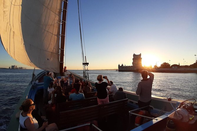 2-Hour Lisbon Traditional Boats Sunset Cruise with White Wine - Boarding a hand-painted traditional boat