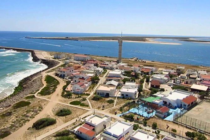 2 Stop | 2 Islands & Ria Formosa Natural Park - From Faro - Farol Island: lighthouse views and a livelier feel