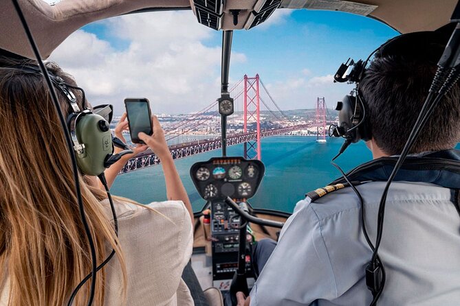 360º Lisbon: Helicopter Flight, Boat Trip and Old Town Walking - The yellow Elevador da Glória is currently off the menu