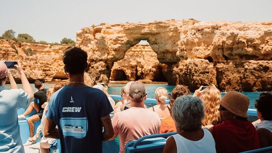 Albufeira: 2.5-Hour Dolphin Watching and Caves Trip - Marinha Beach and the approach to Benagil