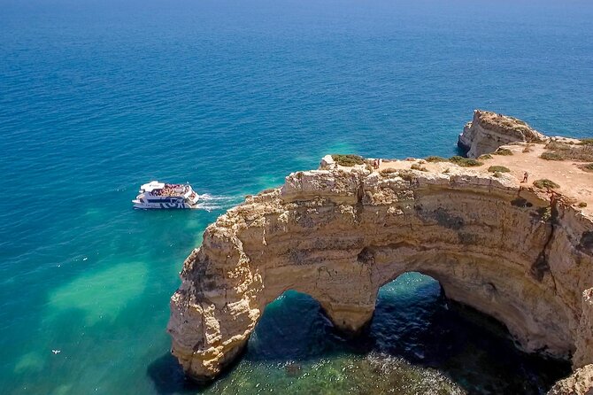 Albufeira Beach BBQ with Caves and Coastline Cruise with Open Bar - Paddleboards, Games, and Free Time