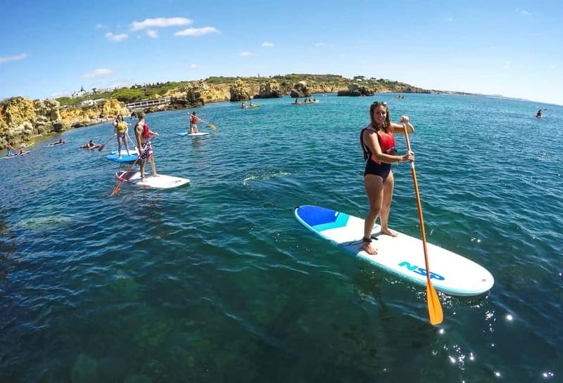 Albufeira: Caves and cliffs Paddleboarding (SUP) Tour - Praia da Coelha and the first cliff views