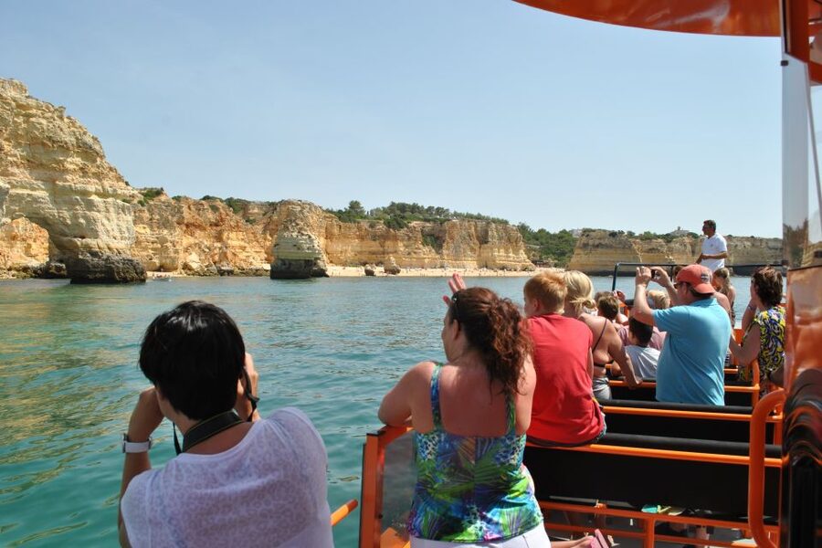 Albufeira: Dolphin Watching and Benagil Cave - Cruising past Carvoeiro Beach and the cliff coast