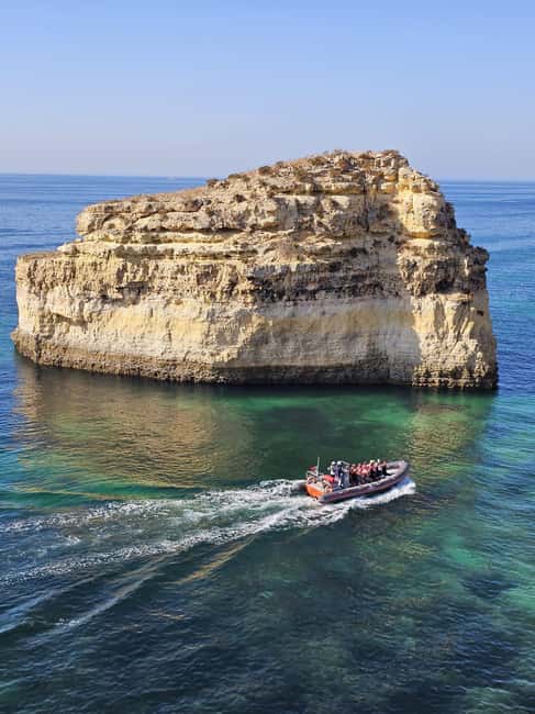 Albufeira: Dolphin Watching and Benagil Cave Boat Cruise - Searching for dolphins in open water