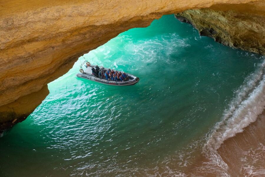 Albufeira: Dolphins, Benagil Caves and Coastline Boat Tour - Getting close to Benagil Cave and the rock formations