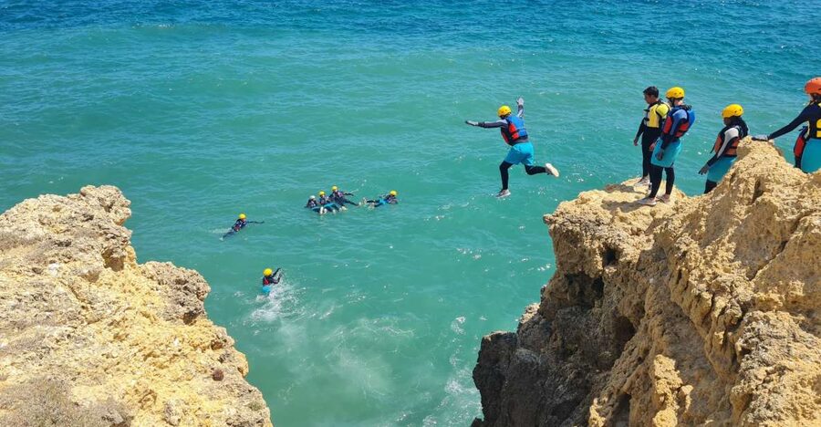 Albufeira: Guided Coasteering Tour with Cliff Jumping - Walking, swimming, and climbing along the Algarve coast
