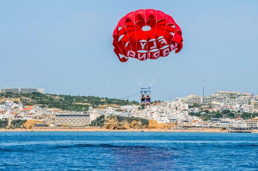 Albufeira: Single, Double or Triple Parasailing Tour - The boat ride and the launch from the stern