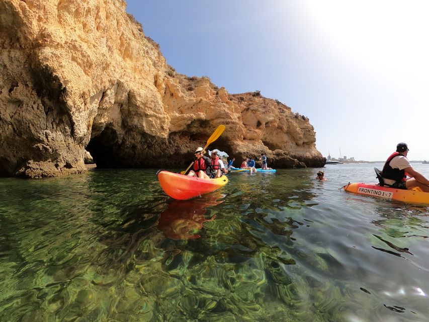Alvor: Explore Caves Boat and Kayak Tour - One hour of kayaking around caves and rock arches