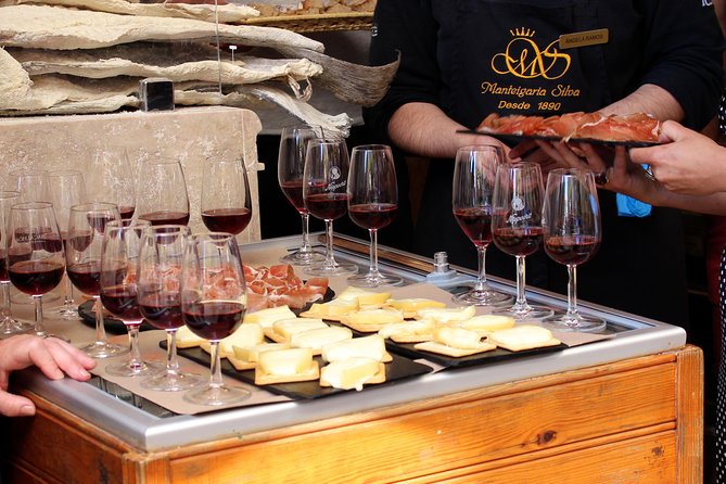 Award-Winning Original Lisbon Food Wine Tour: 19 Curated Tastings - Starting in Baixa with the city’s grand front door