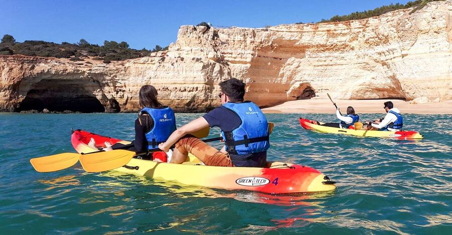 Benagil: Benagil Caves and Secret Spots Guided Kayaking Tour - The first paddle from Benagil Beach