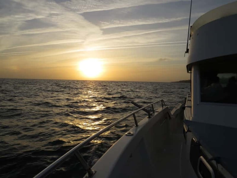 Cascais: Sunset Boat Trip with Welcome Drinks - Heading toward Costa da Guia and the cliffs