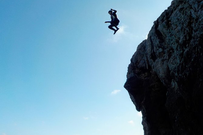 Coasteering and Cliff Jumping Near Lagos - Swimming into caves and along the rocks
