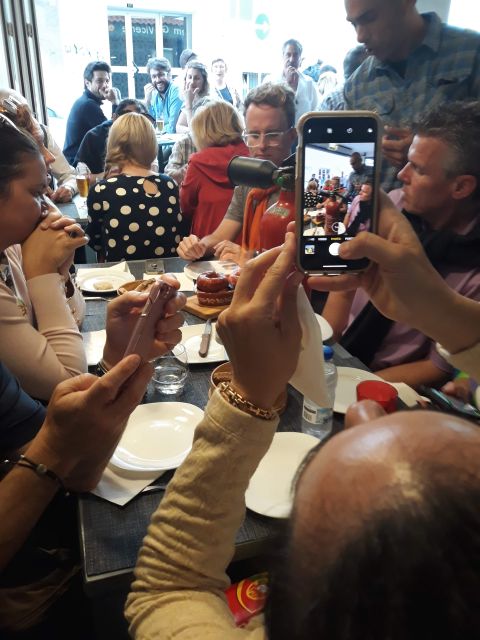 Faro: Old Town Guided Walking Food Tour - Meeting your guide beneath Faro’s old arch