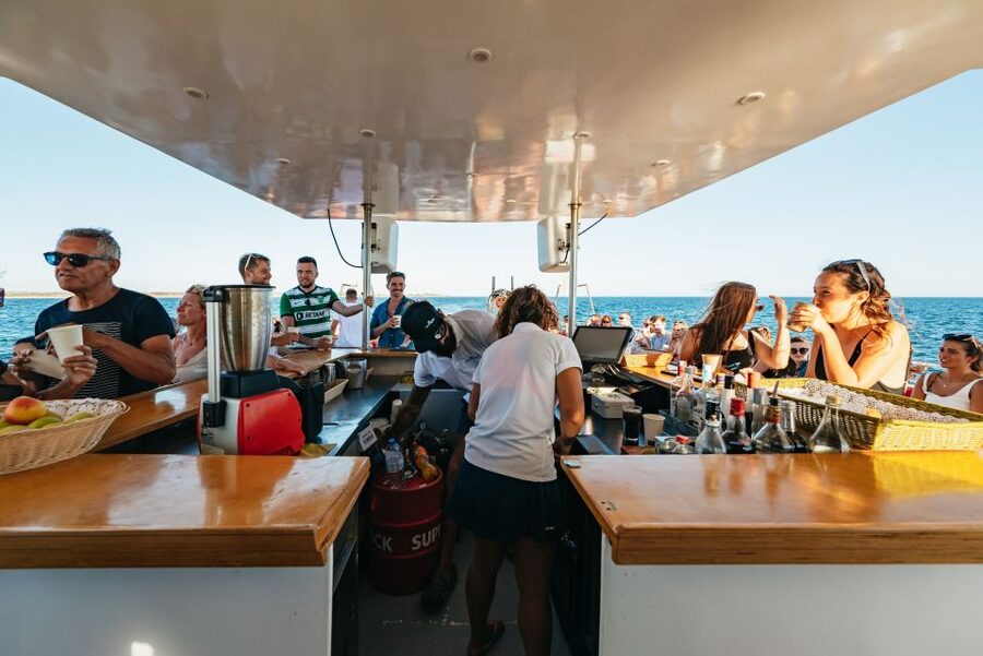 From Albufeira: Sunset Cruise and Beach BBQ with Open Bar - The return to Albufeira after dark
