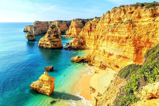 From Faro: Benagil Cave, Marinha & Carvoeiro Full-Day Tour - Meeting the van beside Faro Customs House