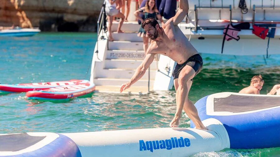 From Lagos: Algarve Cruise by Catamaran - The anchorage: swimming, paddle boards, and the inflatable course