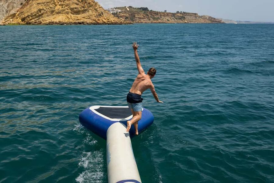From Lagos: Algarve Golden Coast Cruise - Anchoring near Burgau for swimming and play
