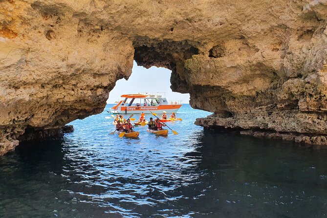 From Lagos: Kayak Tour of Ponta da Piedade Caves on Catamaran - Swimming, the slide, and getting wet