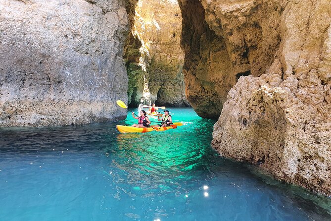 From Lagos: Kayak Tour of Ponta da Piedade Caves on Catamaran - Paddling through the caves and cliffs