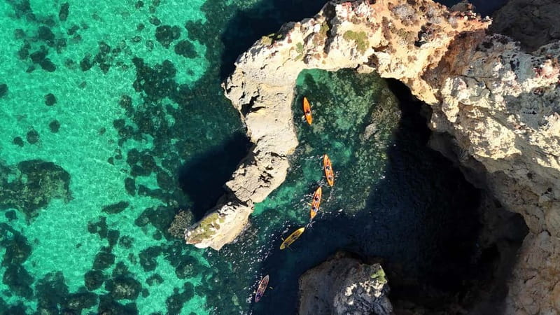 From Lagos: Ponta da Piedade Caves Kayak Tour from Catamaran - The 15-minute swim and boat slide