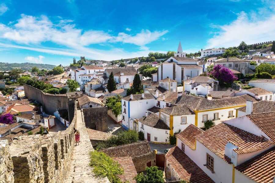 From Lisbon: Day Trip to Porto, Óbidos, and Nazaré - Nazaré: fishing traditions and the giant-wave viewpoint