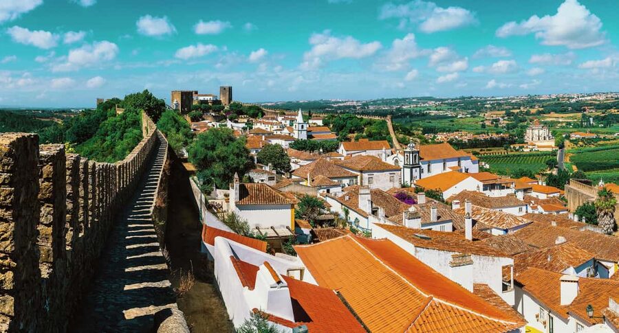 From Lisbon: Nazare Big Waves and Óbidos Guide Day Trip - Key points at a glance