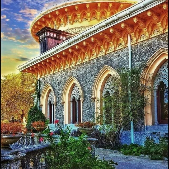From Lisbon: Pena Palace, Regaleira, Sintra & Cascais Tour - Pena Palace: color, terraces, and mountain views