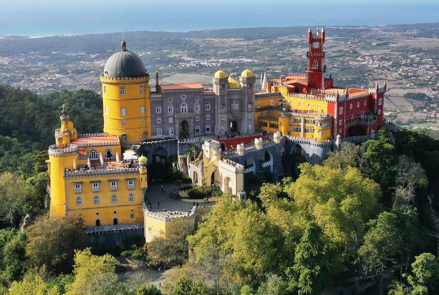 From Lisbon: Sintra, Pena, Regaleira, Roca and Cascais Tour - Sintra town and the first palace views
