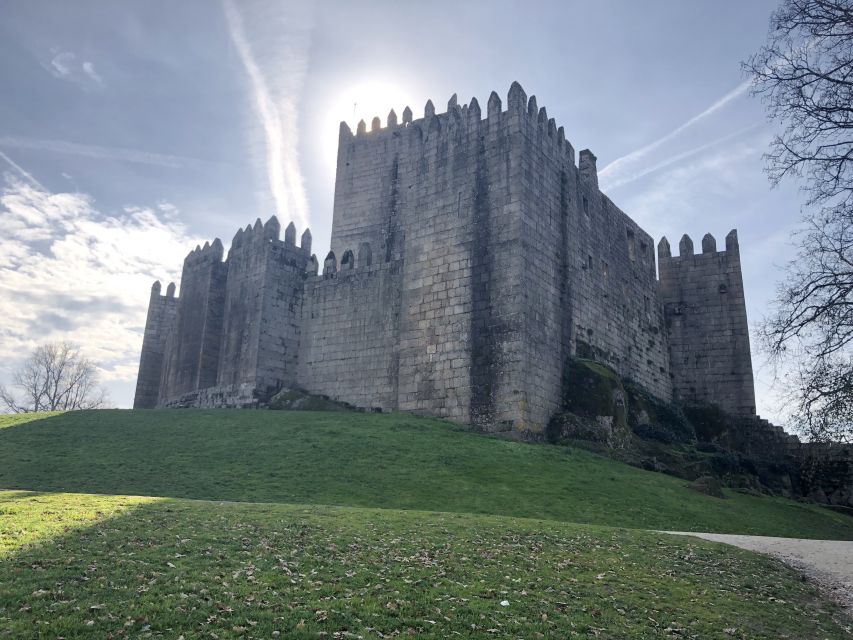 From Porto: Braga & Guimarães with Lunch Small Group Tour - Guimarães Castle and Portugal’s beginnings