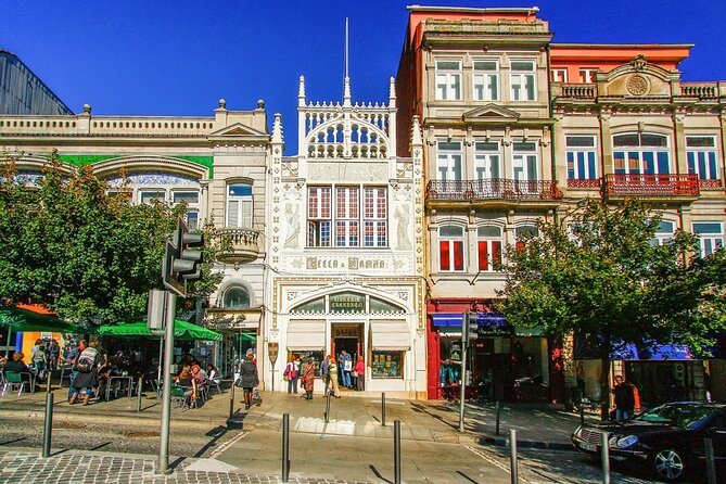 Historic Porto by Private Electric Tuk Tuk to Top Landmarks - The old town, steep lanes, and river views