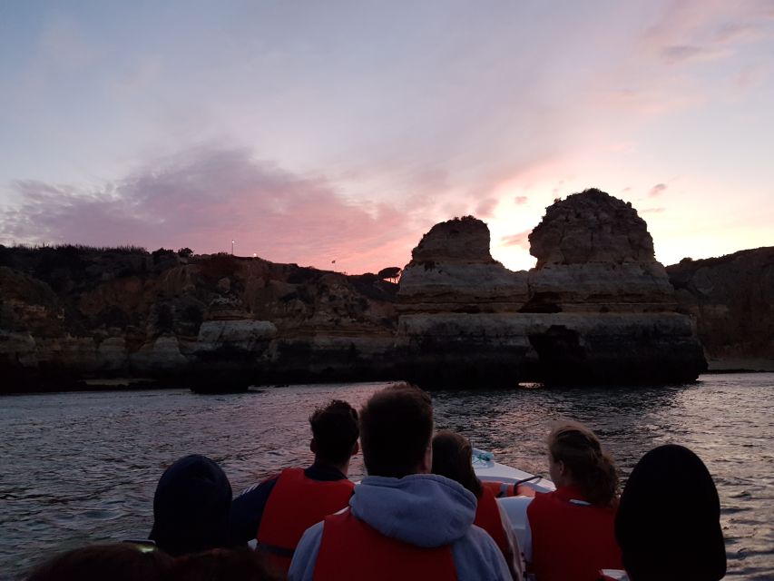 Lagos: Guided Ponta da Piedade Sunset Boat Tour - Guide quality and the multilingual format