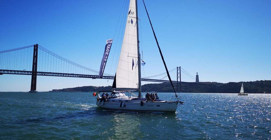Lisbon: 2-Hour Sailing Yacht Cruise & Guided Tour w/2 drinks - Belém Tower and the 25 de Abril Bridge