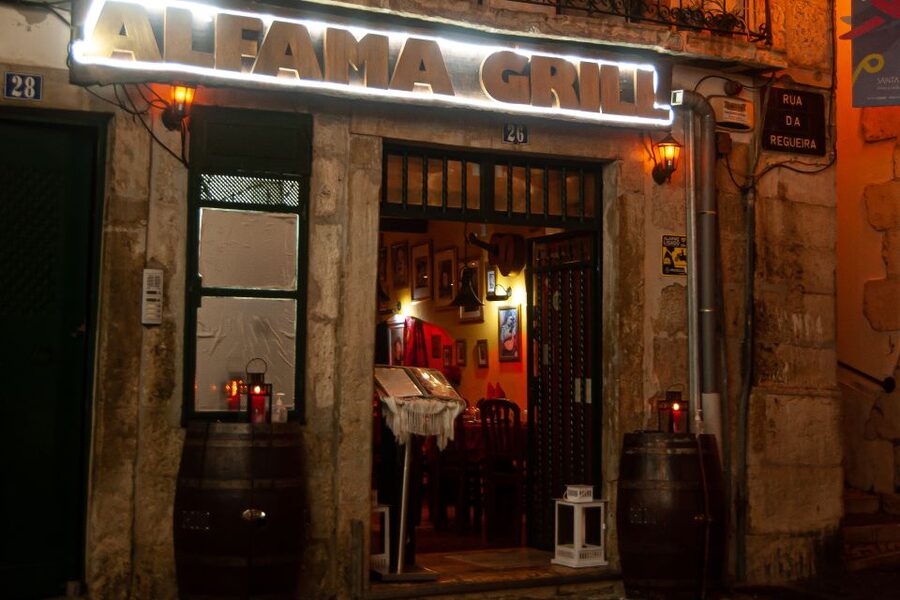 Lisbon: Alfama Tour and Live Fado with Traditional Dinner - Portuguese dinner, with a set menu and one drink