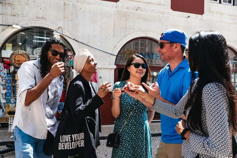 Lisbon: Baixa District Food Tour with Dinner and Drinks - Praça Dom Pedro IV and the walk through central Lisbon