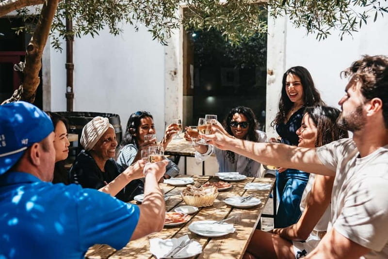 Lisbon: Baixa District Food Tour with Dinner and Drinks - St. Dominic’s Square and the social side of petiscos