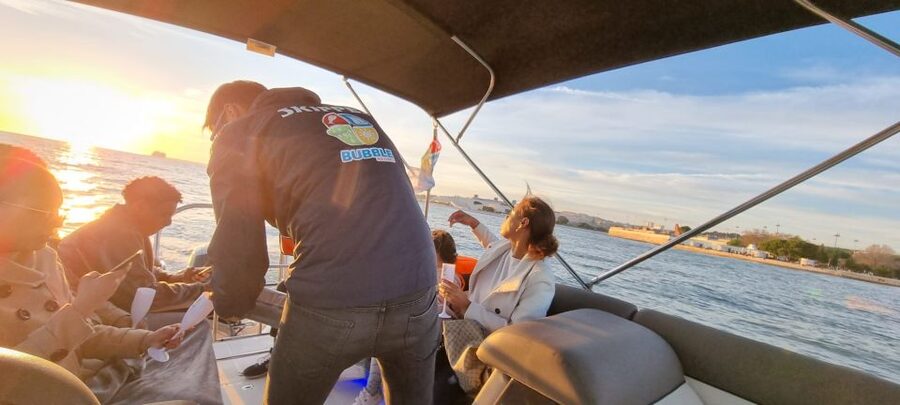 Lisbon: Boat Tour with Champagne - Commerce Square and the heart of Lisbon