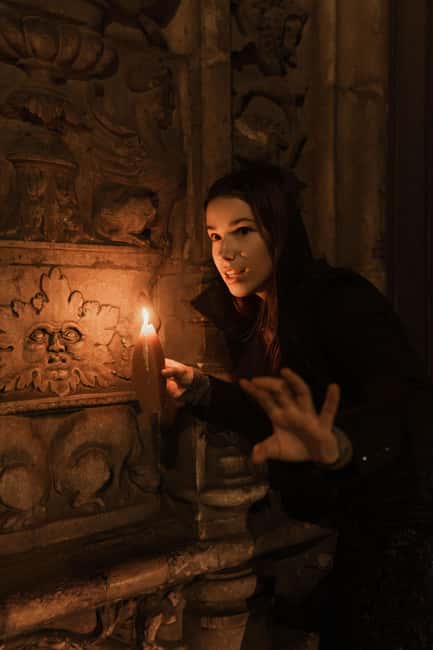 Lisbon by Night: Guided Walking Tour - The Unholy Secrets - Meeting a lantern at Rossio Square