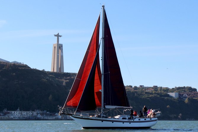 Lisbon: Daylight or Sunset on a Vintage Sailboat - The 25 de Abril Bridge and Christ the King