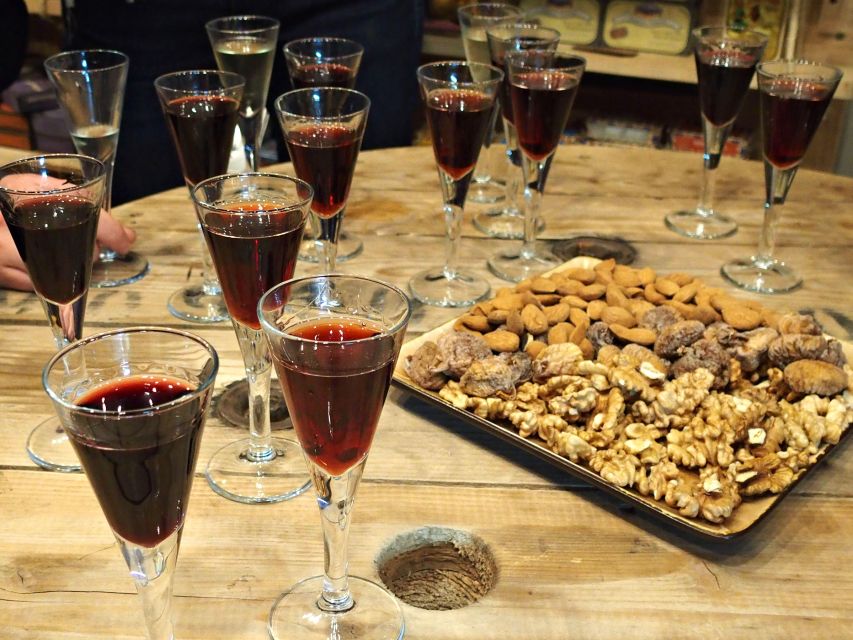 Lisbon: Evening Local Food Crawl with Drink Pairings - Small restaurants and streets beyond the usual route