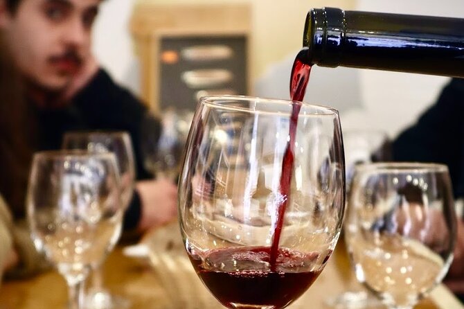 Lisbon Food Tour with 10+ Tastings of Local Delicacies & Wines - Cheese, pata negra, and the first serious tasting