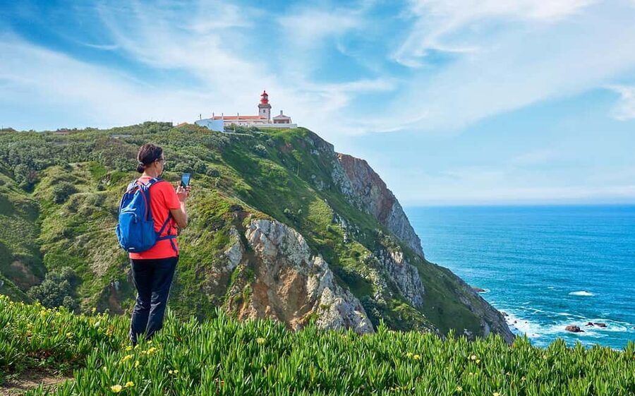 Lisbon: Pena Palace, Sintra, Cabo da Roca & Cascais Day Tour - Pena Palace: colorful walls, wooded slopes, and one key limitation