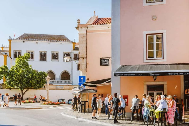 Lisbon: Sintra Cascais & Pena Palace Small Group Tour - Cascais: a relaxed final stop