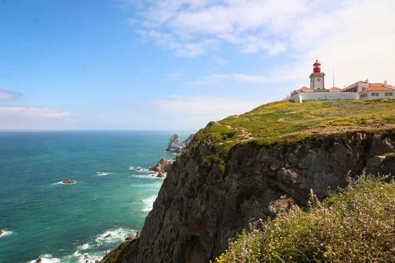 Lisbon: Sintra, Pena, Cascais & Cabo Day Tour with Tickets - Guincho Beach on the coastal road