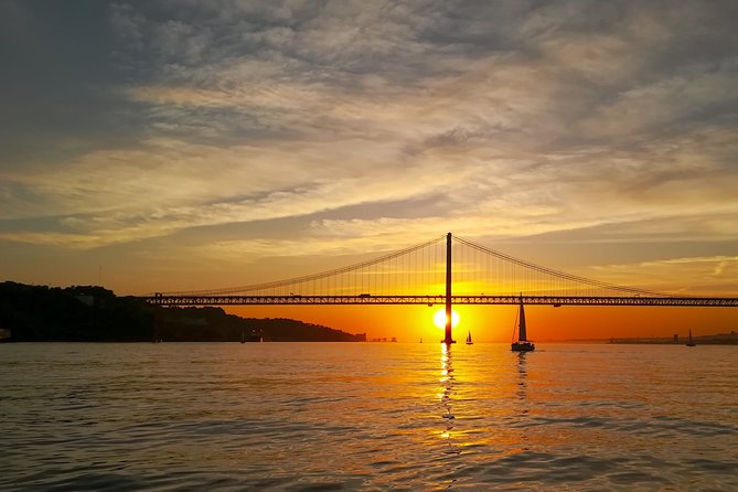 Lisbon Small Group 2h Sunset Sailing- Live Commentary & a Drink - Commerce Square and Saint George’s Castle in the distance