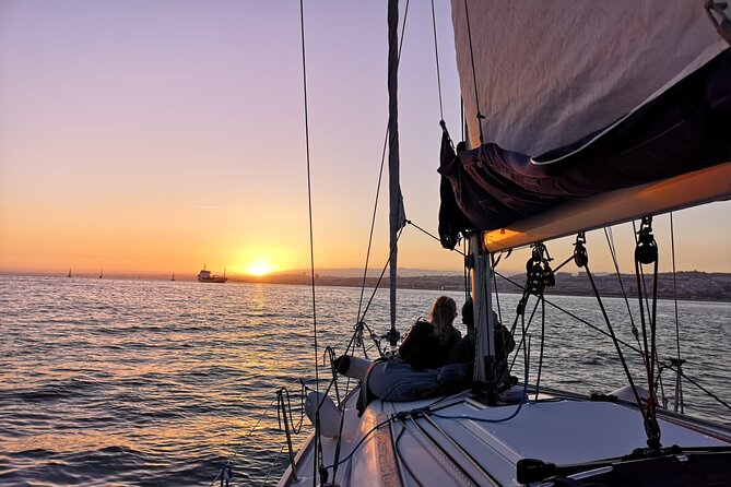 Lisbon Small Group 2h Sunset Sailing- Live Commentary & a Drink - The drink, the commentary, and the sunset