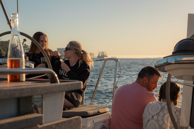 Lisbon Sunset Boat Cruise Tour With Drinks Included - Commerce Square and Lisbon’s old eastern hills