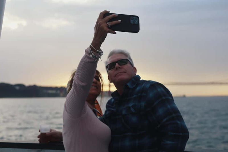 Lisbon: Sunset Boat Tour with Music and Drinks - Alfama and the view toward Christ the King