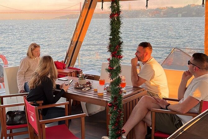 Lisbon: Sunset Catamaran Boat Tour with Music and Drinks - Drinks, music, and the changing mood onboard