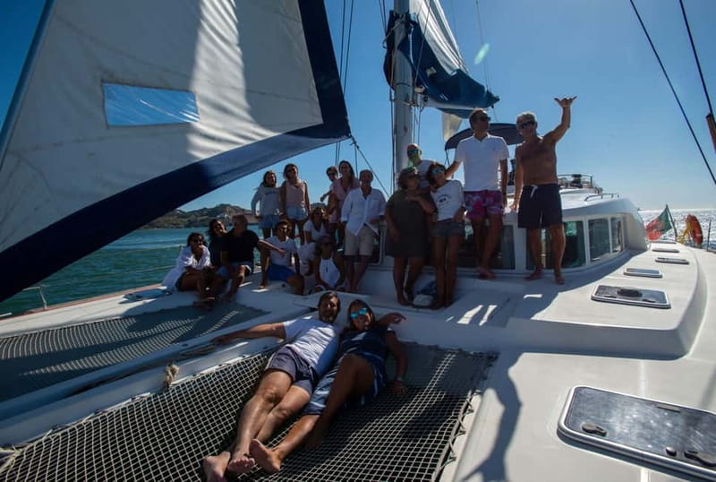 Lisbon: Sunset Catamaran Cruise with Drinks - Meeting at Doca do Espanhol, Gate 3